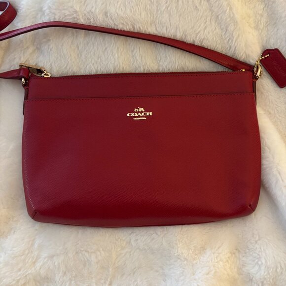 Gently used (once or twice( Coach small crossbody with coach insert. - Picture 1 of 7